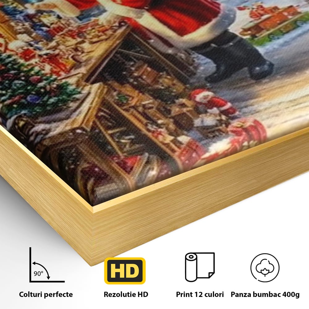 Detaliu al suprafetei: ilustratie digitala cu mos craciun in atelier, in rama de aluminiu auriu